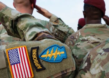 Army paratroopers from the 82nd Airborne Division based at Fort Bragg, North Carolina, are seen saluting in a file photo from June 12, 2025, during a reenlistment ceremony in conjunction with the Army's 250th Anniversary Parade in Washington, D.C.