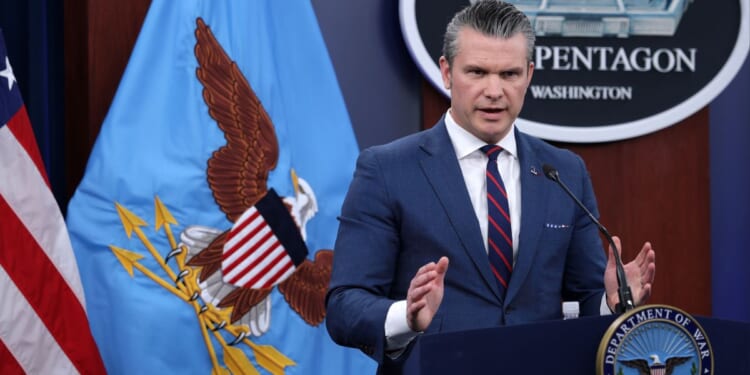 Secretary of War Pete Hegseth speaks during a news conference Monday at the Pentagon in Arlington, Virginia.