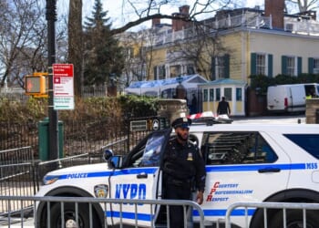 A New York Police Department officer stands guard outside of Gracie Mansion on March 9, 2026, in New York City.