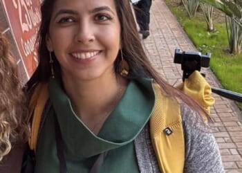Police release CCTV of missing Brazilian academic who vanished a week ago on visit to a UK university as her bag is found near boatyard 'where she leapt over a fence'