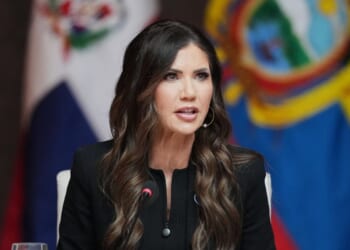 Secretary of Homeland Security Kristi Noem delivers remarks during a working lunch at the "Shield of the Americas" Summit at Trump National Doral in Miami, Florida, on March 7, 2026.