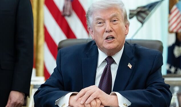 President Donald Trump sits at the Resolute Desk on Tuesday. White House press secretary Karoline Leavitt said Tuesday night that the President will give an 'Address to the Nation' Wednesday at 9 p.m. ET to give an update on Iran