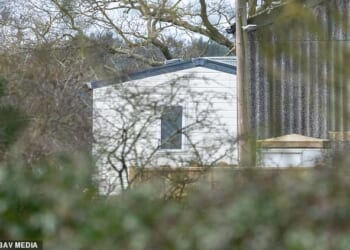 The massive white mobile home has been set up amid a stable block to hide it from view. It is thought to be to house staff after his downsizing from Royal Lodges leaves him wanting more space
