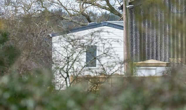 The massive white mobile home has been set up amid a stable block to hide it from view. It is thought to be to house staff after his downsizing from Royal Lodges leaves him wanting more space
