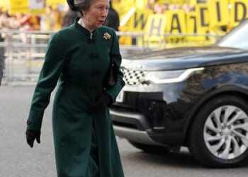 Princess Anne walking past a group of anti-monarchy protestors outside Westminster Abbey on Monday