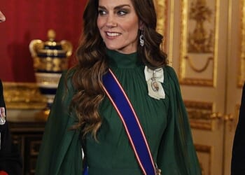 The Princess of Wales dazzled in a green evening gown by Andrew Gn with her favourite Lovers' Knot Tiara and earrings belong to Queen Elizabeth II