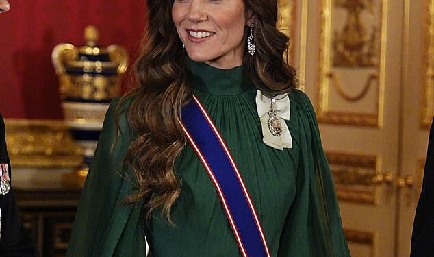 The Princess of Wales dazzled in a green evening gown by Andrew Gn with her favourite Lovers' Knot Tiara and earrings belong to Queen Elizabeth II