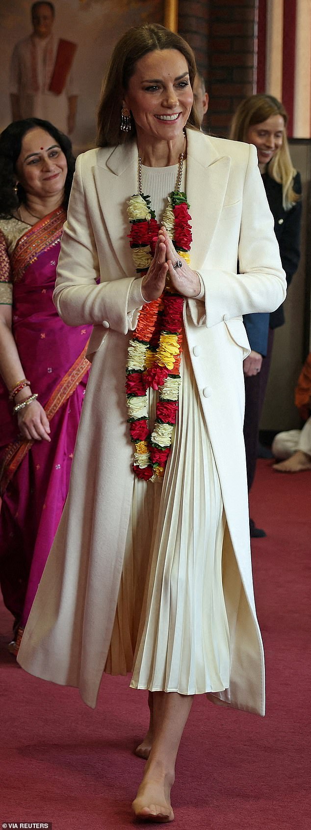 The Princess of Wales looked elegant in a Ralph Lauren dress as she visited the Shreeji Dham Haveli Hindu Temple in Leicester yesterday