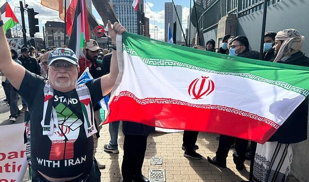 A Scottish man is pictured wearing a 'Stand with Iran' T-shirt during the Al-Quds static protest in London on March 15, 2026