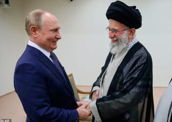 Vladimir Putin pictured in 2022 with Ayatollah Ali Khamenei