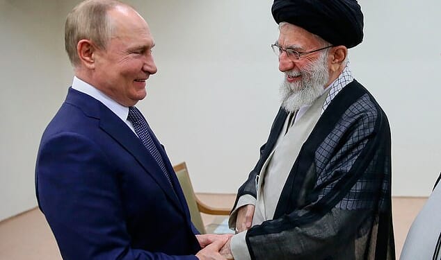 Vladimir Putin pictured in 2022 with Ayatollah Ali Khamenei