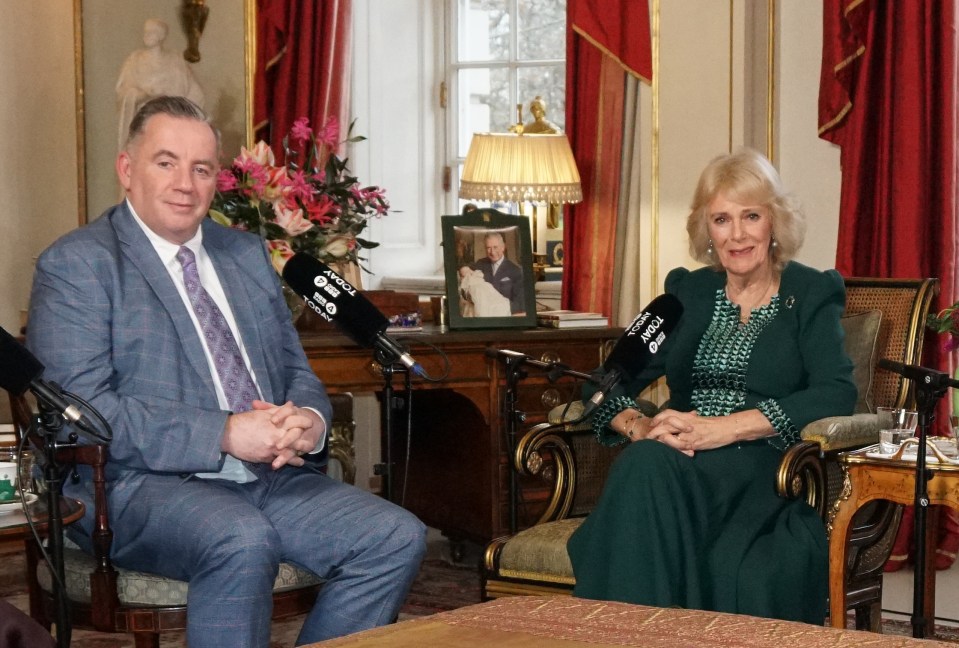 Queen Camilla and John Hunt recording a special radio broadcast.