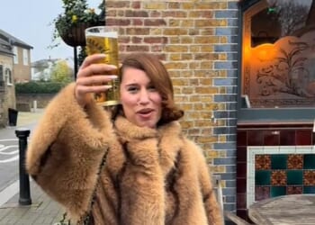 Raye has shared a very public tribute to her past heartbreak in a hilarious TikTok video. The singer posted a clip of herself showing off a blue plaque at The Nightingale pub in London