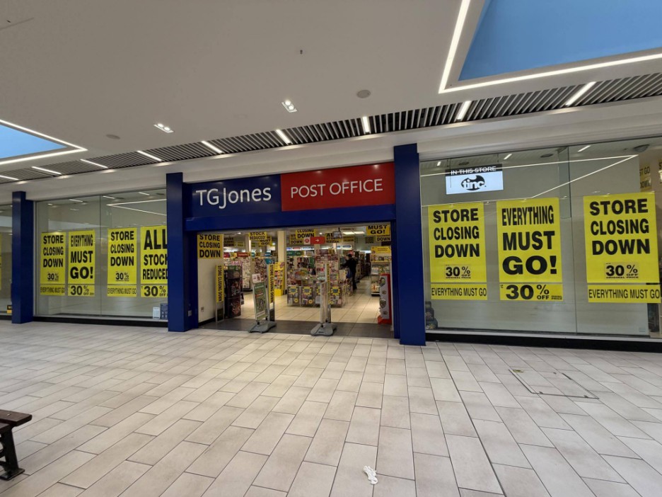 The storefront of TG Jones and Post Office, with "Store Closing Down" and "Everything Must Go" signs offering 30% off.