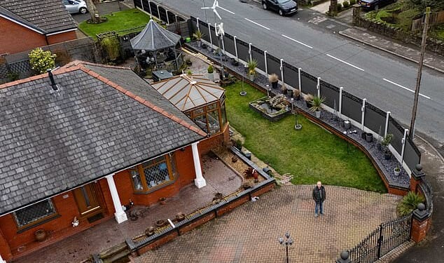 Retired couple forced to tear down £4,500 seven-foot tall privacy fence after neighbours complained it was more intrusive than the nine-foot high hedge it replaced