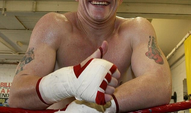 Ricky Hatton smiles during a press day at Betta Bodies Gym in Denton, Manchester, in 2007