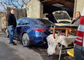 Massimo Palmieri and Rocco Grasso pictured in the lane. The pair were alleged to run an unlawful mechanic business, obstructing access