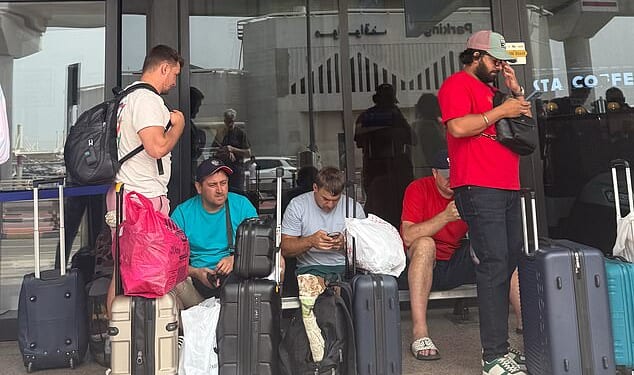 Rush to escape Dubai by bus, taxi and jet: Chaos and gruelling 16-hour journeys across the desert - while the wealthy fight for spots on £143k private jet flights
