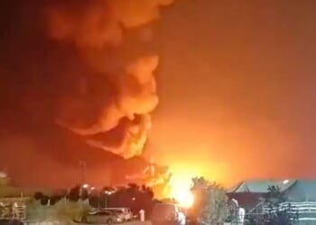 Smoke rises from an explosion in the direction of Ali Al Salem Air Base, a major military base in Kuwait that hosts U.S. and allied forces, amid the U.S.-Israeli conflict with Iran