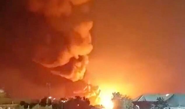 Smoke rises from an explosion in the direction of Ali Al Salem Air Base, a major military base in Kuwait that hosts U.S. and allied forces, amid the U.S.-Israeli conflict with Iran