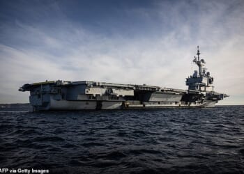A French sailor appears to have accidently revealed the position of an aircraft carrier after recording a run on the fitness app Strava while jogging on deck (stock image of Charles-de-Gaulle)