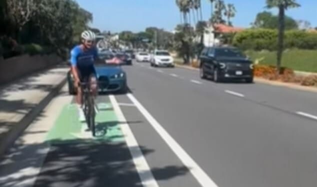 Luke Fetzer and Ben Byra (pictured) were riding in the bike lane on the East Coast Highway in Newport Beach when an angry BMW driver dangerous tailed them
