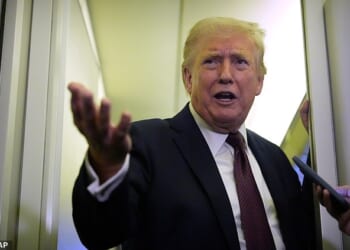 President Donald Trump speaks to reporters aboard Air Force One, Sunday, March 15, 2026, en route from West Palm Beach, Fla. to Joint Base Andrews, Md. (AP Photo/Mark Schiefelbein)