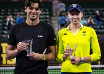 A man has come under fire from tennis fans after appearing to touch the body of Kazakhstan star Elena Rybakina during a trophy presentation at Indian Wells in the US
