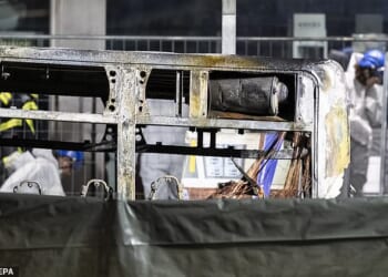 Photographs show the bus having been completely gutted by the flames