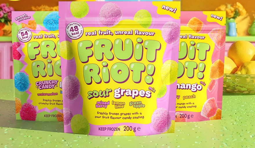 Three brightly colored bags of Fruit Riot! sweets: Watermelon, Sour Grapes, and Mango.