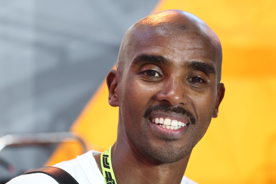 Mo Farah smiling at the Formula 1 Grand Prix of Qatar.