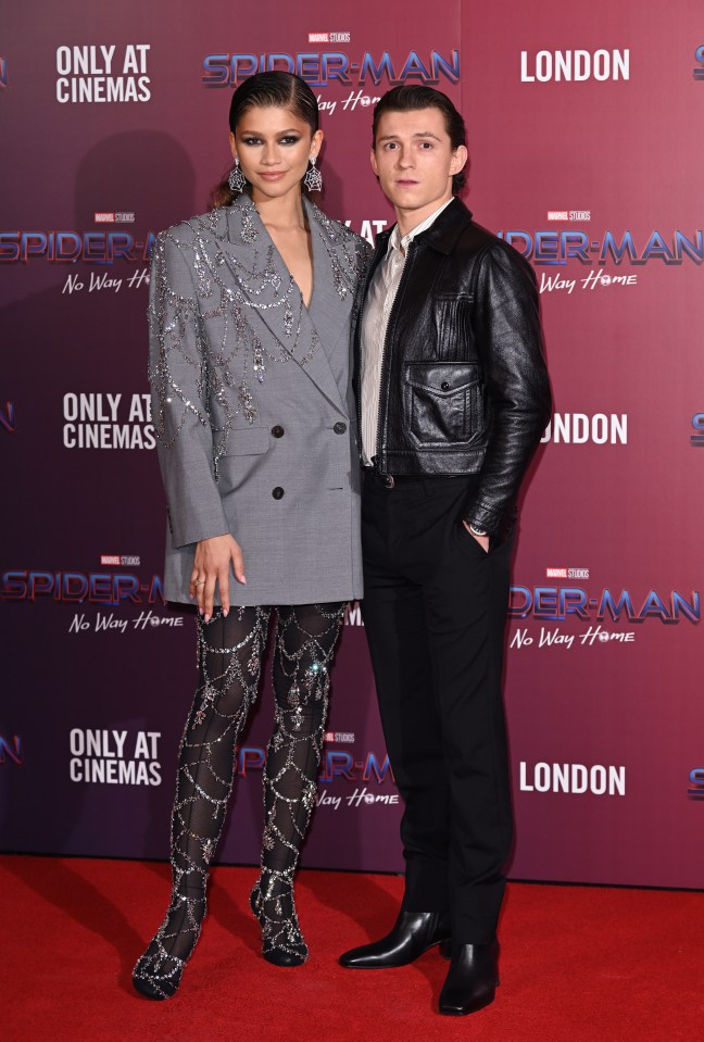 Zendaya and Tom Holland at a photocall for "Spiderman: No Way Home".