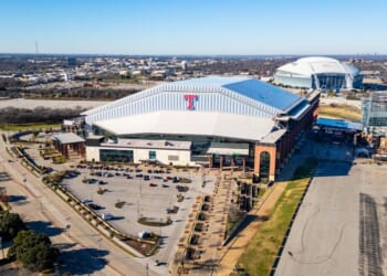Globe Life Field is home to Major League Baseball's Texas Rangers, with AT&T Stadium in the background on Dec. 29, 2023, in Arlington, Texas.