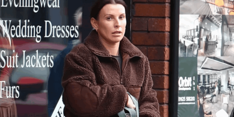 Stony-faced Coleen spotted after 'worse for wear' husband Wayne Rooney parties with two mystery women before Brits