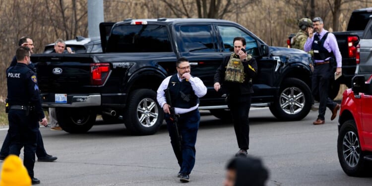 Law enforcement respond near Temple Israel Thursday in West Bloomfield, Michigan, following reports of an active shooter.