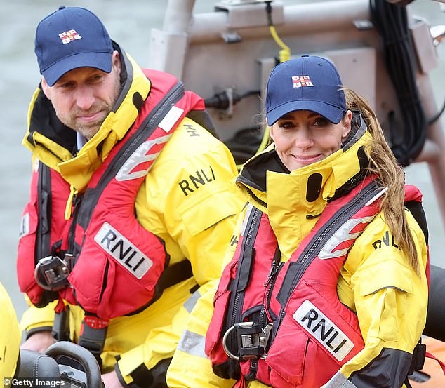 Pictured: The Prince and Princess of Wales onboard an E class inshore lifeboat during their visit to the RNLI Tower Station yesterday