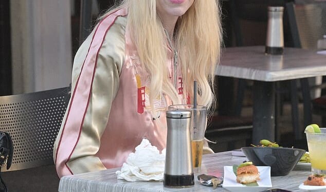 Tara Reid has resurfaced publicly for the first time since the investigation into claims she was secretly drugged at a hotel bar was closed three months ago