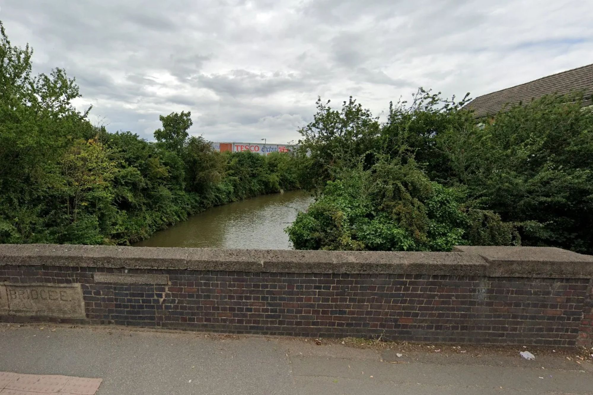 An image collage containing 1 images, Image 1 shows Rowley's Green Canal with a Tesco Extra sign visible in the background