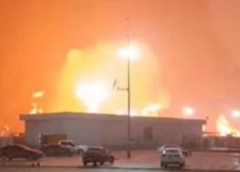 Terrifying moment huge fire rips through oil refinery killing 5 in Mexico after torrential rains sparked deadly inferno