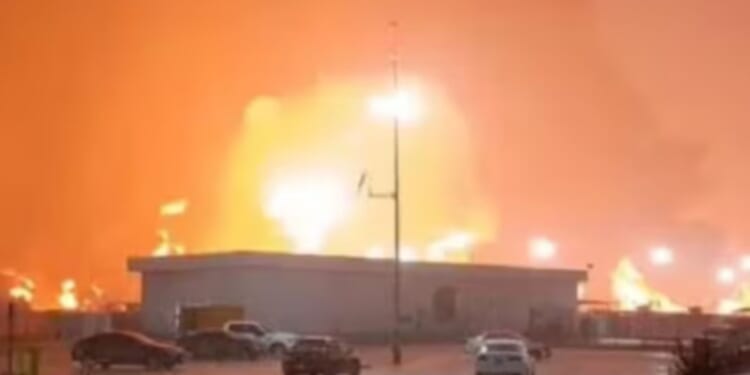Terrifying moment huge fire rips through oil refinery killing 5 in Mexico after torrential rains sparked deadly inferno
