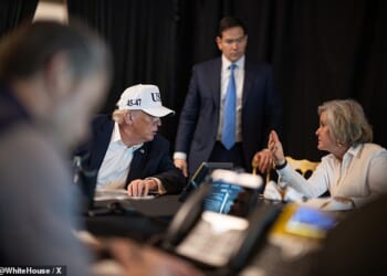 Trump speaks to White House Chief of Staff Susie Wiles while Marco Rubio stands in the background