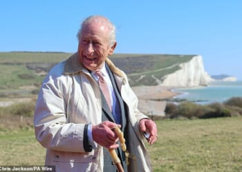 The King surprised walkers enjoying a sunny day in the countryside as he took a stroll on a ‘marvellous’ new coastal path named in his honour
