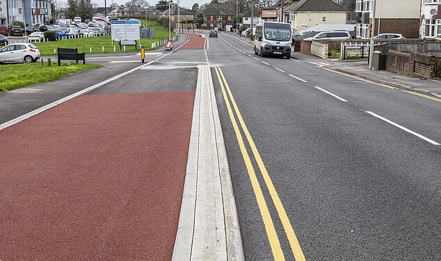 At over 11ft wide in places, the new bike lane actually exceeds the width of the neighboring 10ft-wide road, squeezing motor traffic into a narrower lane than the cyclists