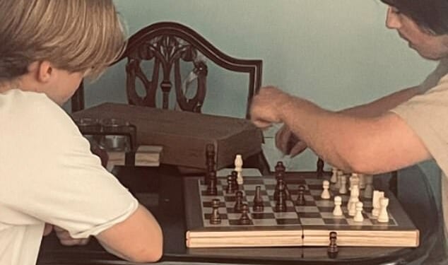 Angela Shellis was a doting mother who was happiest when she was at home with 'my boys' - her 18-year old son Tristan Roberts (right) and his brother Ethan, seen here playing chess