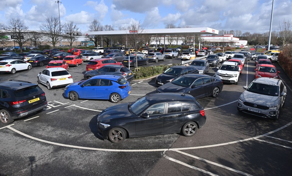Cars queueing for fuel at Costco in Manchester.