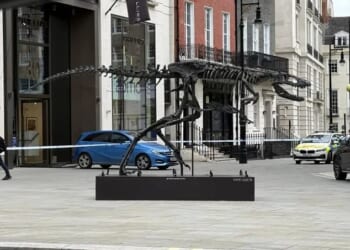 It was one of the most audacious robberies in London: a blue Mercedes driving full speed into the reinforced glass doors of Phillips Auction House, a high-end art dealer in Berkeley Square, Mayfair. Pictured: Police outside the building in June last year after the break-in on May 26