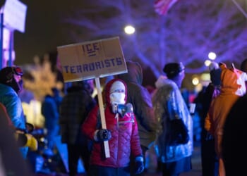 Anti-ICE agitators form a crowd outside of the Whipple federal building in Minneapolis, Minnesota, on Jan. 17, 2026.