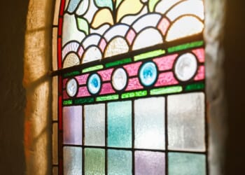 A stained-glass window is seen in an English church in a file photo dated March 18, 2020.