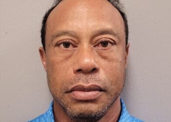 Tiger Woods stares down the lens in his police mugshot after being arrest for DUI on Friday