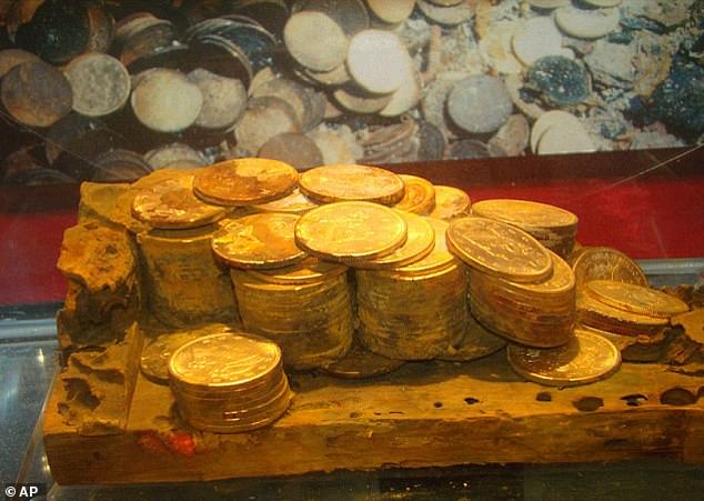 The gold remains of a wooden cargo box unearthed from the SS Central America. The gold was unearthed after Thompson successfully located the wreck, which went down in a hurricane off South Carolina in 1857, killing 425 people